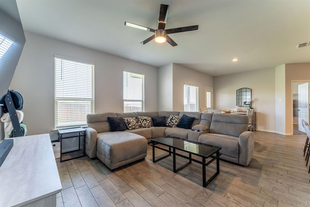 9712 Cherryville Road Fort Worth, TX 76108 - Photo 14 of 27 a living room with furniture and a window