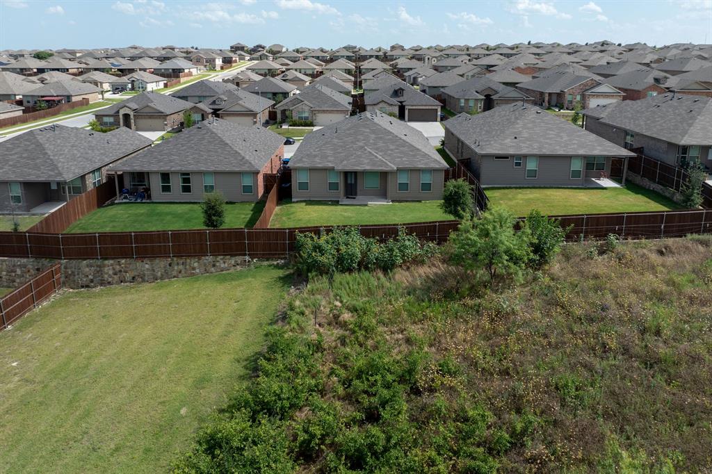 9712 Cherryville Road Fort Worth, TX 76108 - Photo 23 of 27 an aerial view of a house with a garden