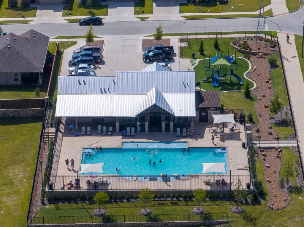 9712 Cherryville Road Fort Worth, TX 76108 - Photo 26 of 27 an aerial view of a house with a garden and lake view