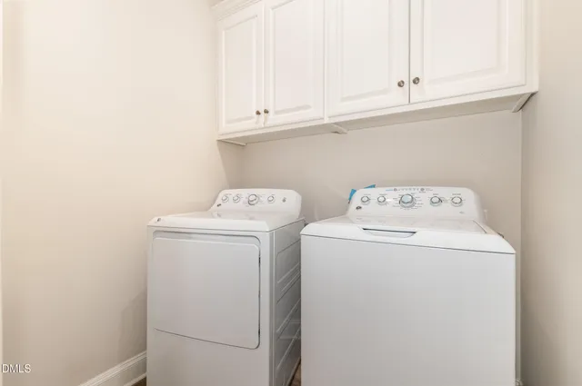 a kitchen with stainless steel appliances a refrigerator stove and sink