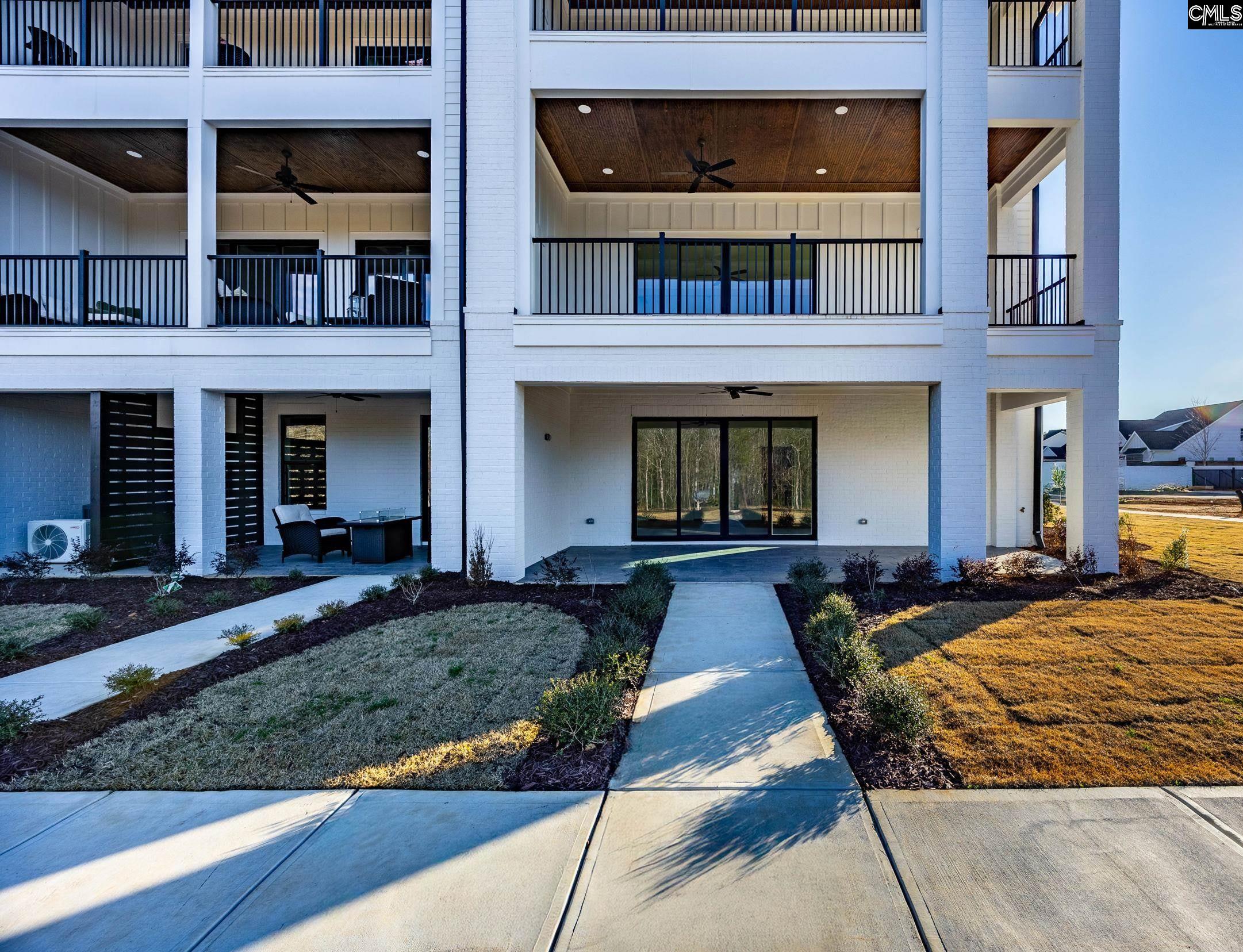 1318 Long Grove Way Lexington, SC 29072 - Photo 35 of 90 a view of a brick building with many windows