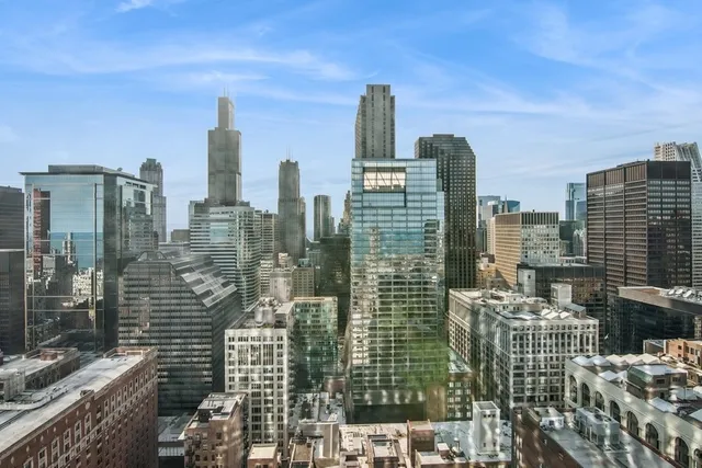a view of city with tall buildings