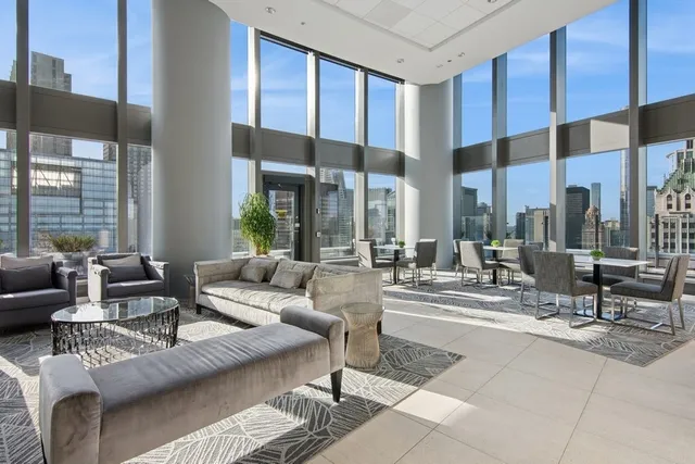 a view of city with tall buildings