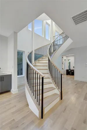 a view of staircase with white walls and white walls