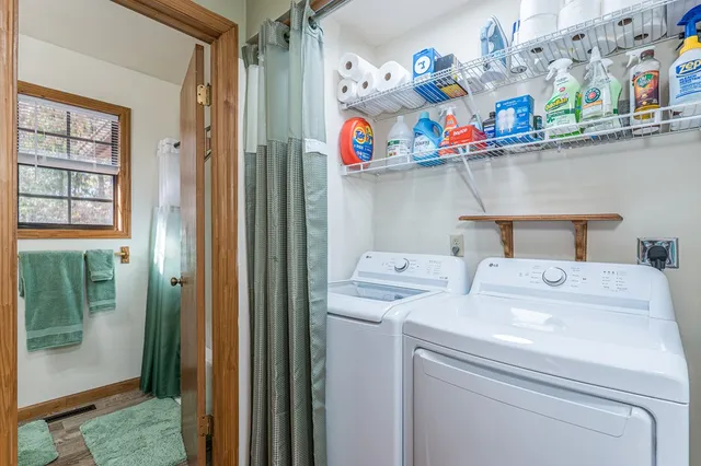 a utility room with dryer and washer