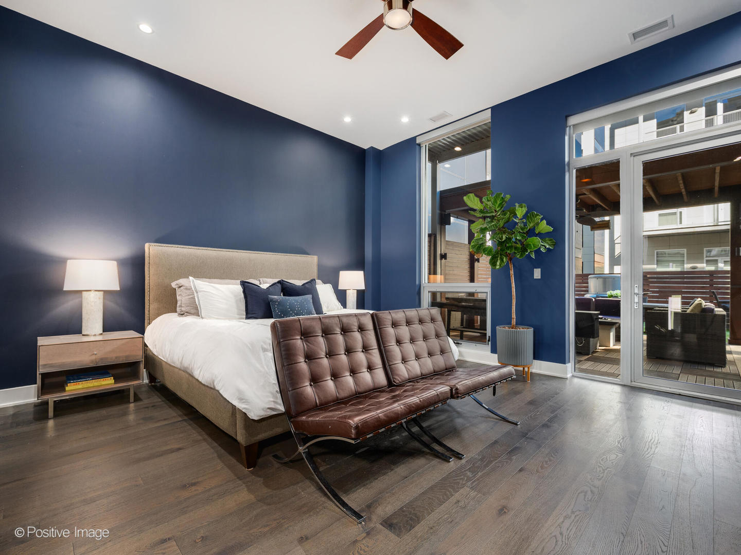 23 North Aberdeen Street, Unit 2N Chicago, IL 60607 - Photo 16 of 29 a bedroom with a bed window and a couch