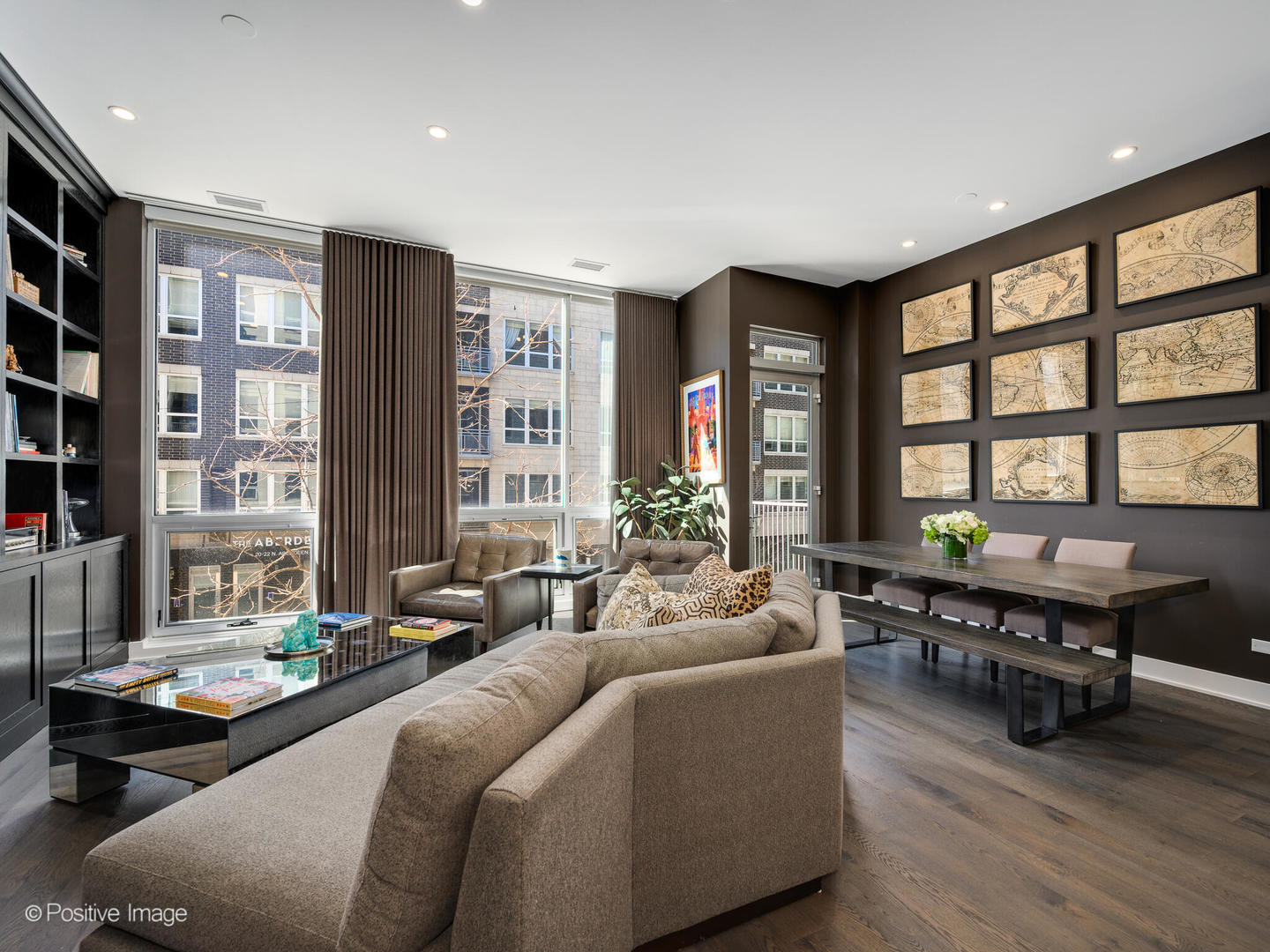 23 North Aberdeen Street, Unit 2N Chicago, IL 60607 - Photo 2 of 29 a living room with furniture and large windows