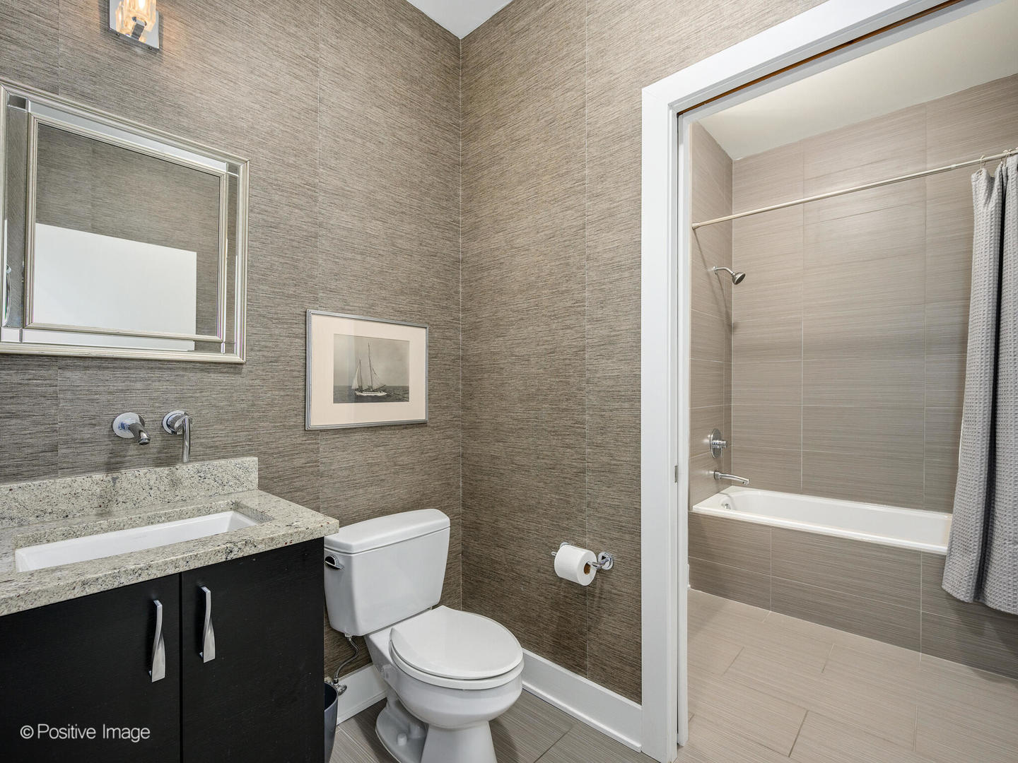 23 North Aberdeen Street, Unit 2N Chicago, IL 60607 - Photo 27 of 29 a bathroom with a sink and a toilet