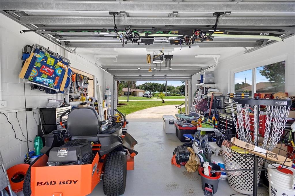 1051 Eva Street Deltona, FL 32725 - Photo 48 of 50 a view of a room with gym equipment