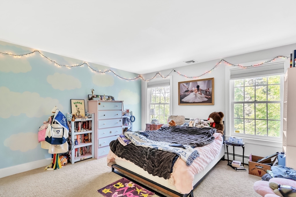 34 Solomon Pierce Road Lexington, MA 02420 - Photo 29 of 42 a bedroom with a bed and a window