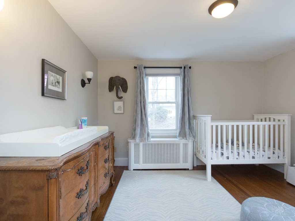 27 Churchill Road Boston, MA 02132 - Photo 23 of 30 a bathroom with a tub sink and a mirror