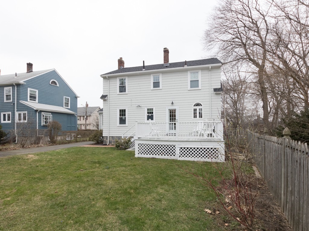 27 Churchill Road Boston, MA 02132 - Photo 28 of 30 a front view of a house with a garden