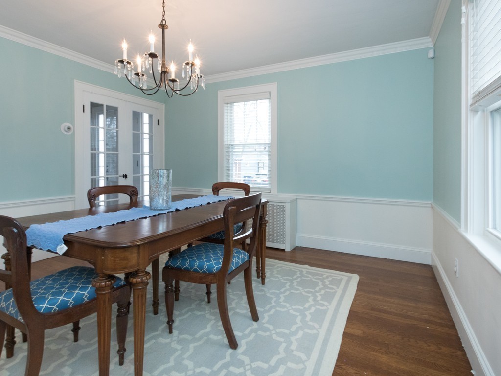 27 Churchill Road Boston, MA 02132 - Photo 8 of 30 a view of a dining room with furniture and wooden floor