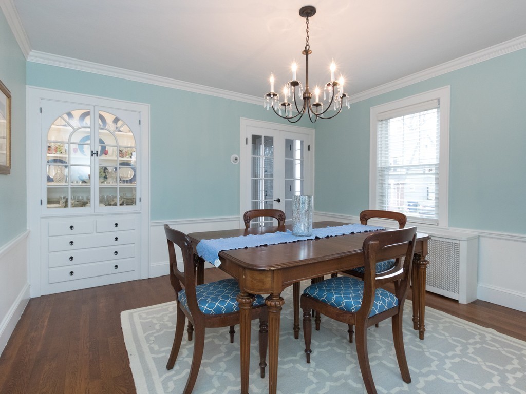 27 Churchill Road Boston, MA 02132 - Photo 10 of 30 a view of a dining room with furniture window and wooden floor