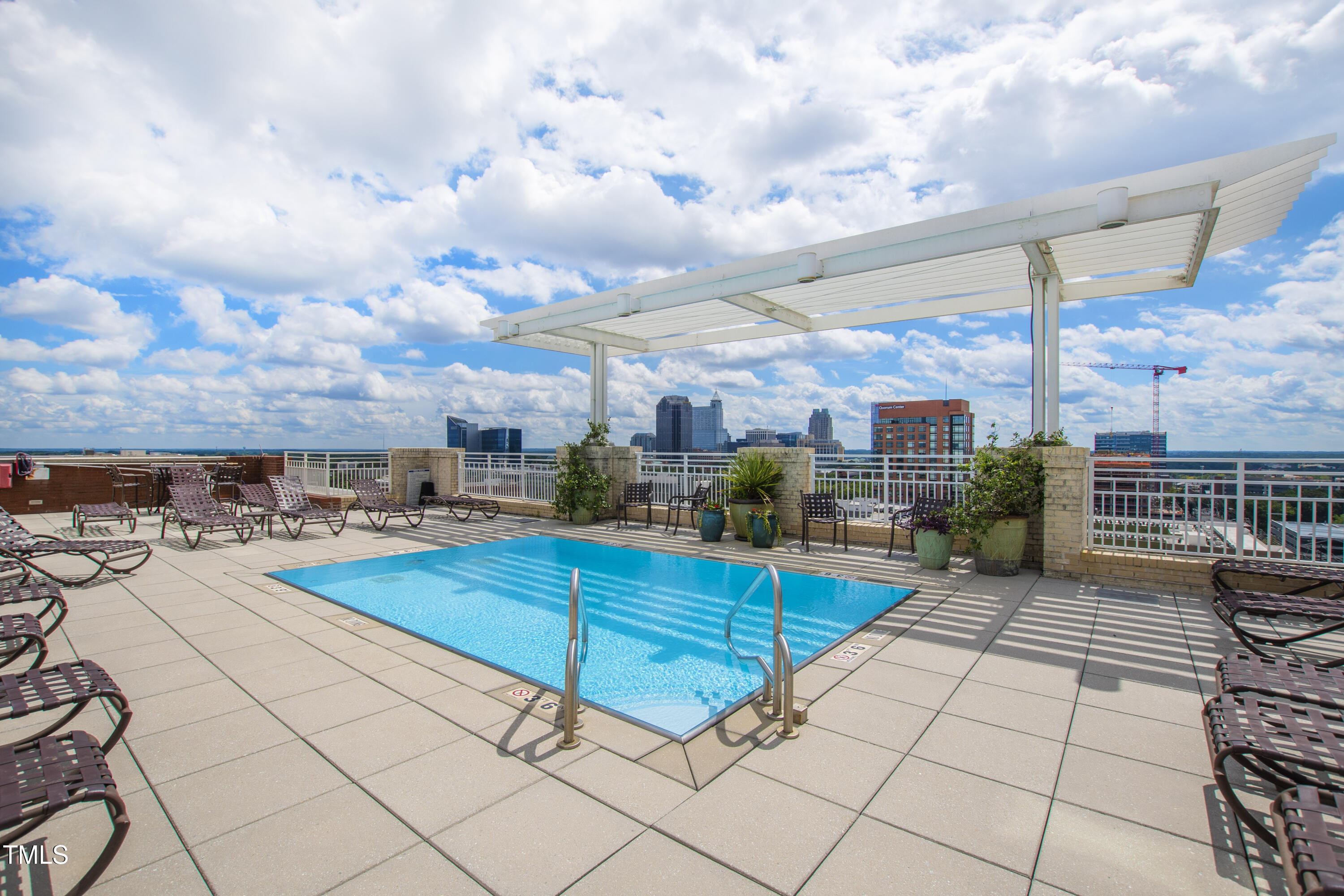 400 West North Street, Unit 610 Raleigh, NC 27603 - Photo 3 of 43 a view of a terrace with lawn chairs
