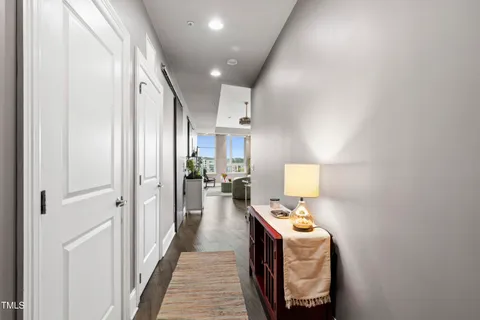 a bathroom with a sink a mirror and shower