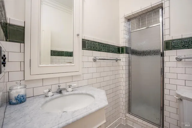 a view of a park with large trees