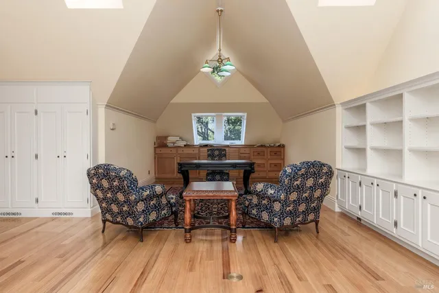 a view of balcony with wooden floor