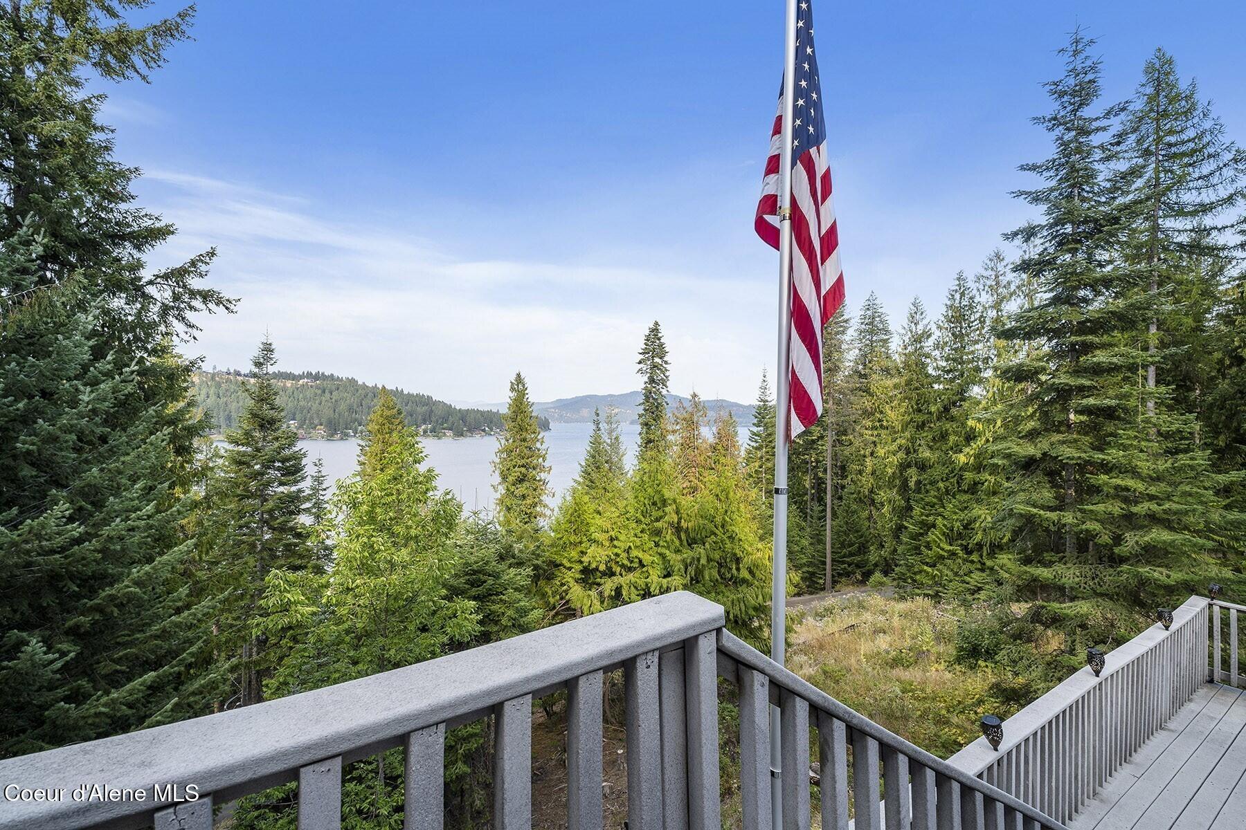19820 South Alcan Road Coeur D'Alene, ID 83814 - Photo 49 of 81 Deck with Lake and Flag View
