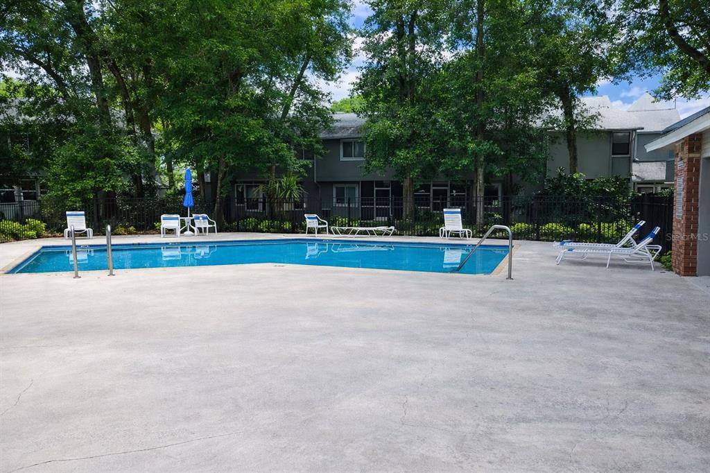 672 Post Oak Circle, Unit 106 Altamonte Springs, FL 32701 - Photo 12 of 21 a view of a house with backyard and a tree