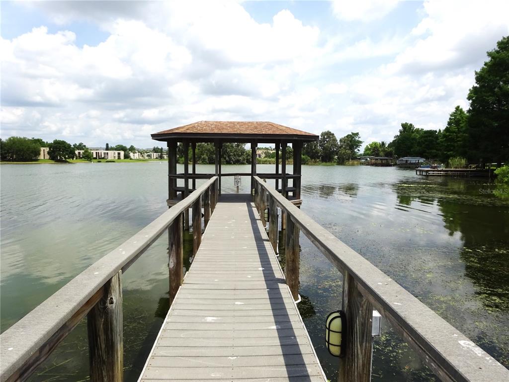 672 Post Oak Circle, Unit 106 Altamonte Springs, FL 32701 - Photo 20 of 21 a view of balcony and lake