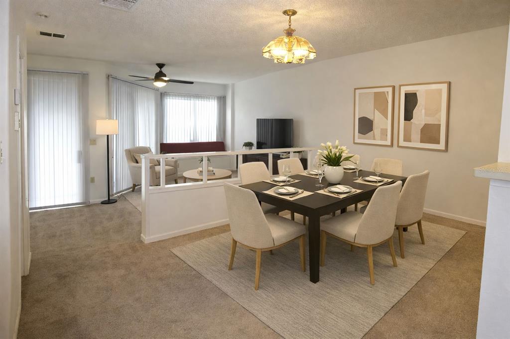 672 Post Oak Circle, Unit 106 Altamonte Springs, FL 32701 - Photo 3 of 21 a view of a dining room with furniture