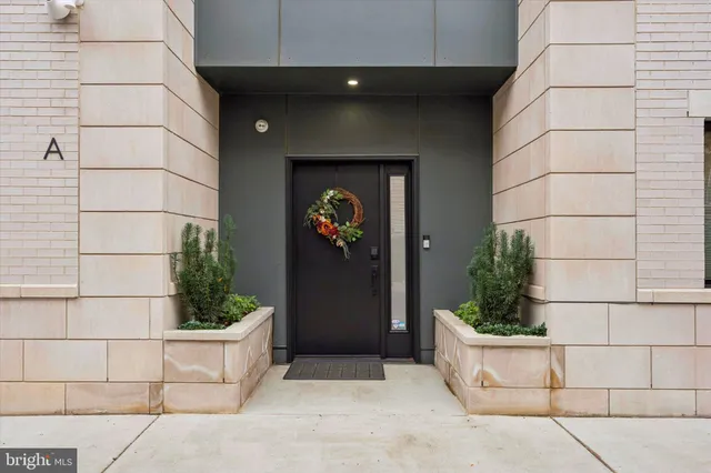 a bathroom with a sink toilet and mirror