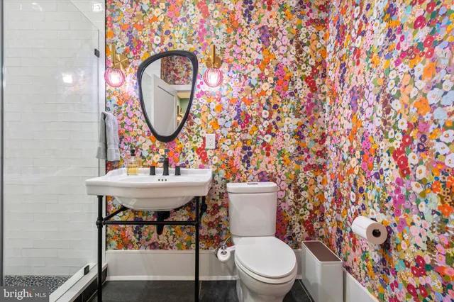 a kitchen with a sink cabinets and appliances