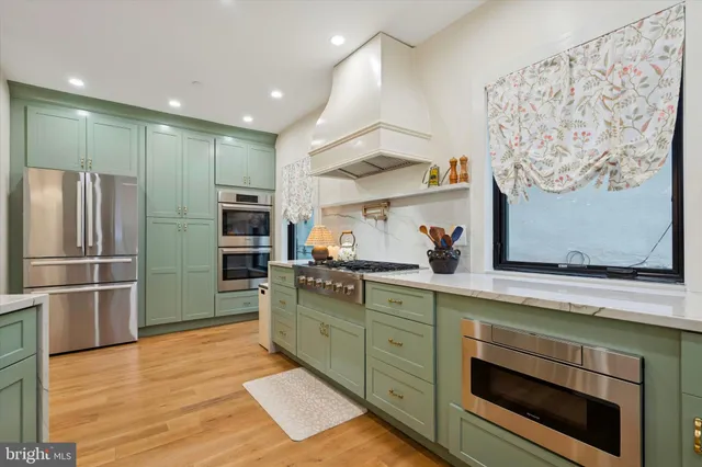 a balcony view with a seating space