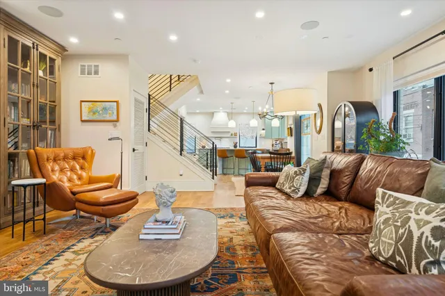 a view of a livingroom with furniture and window