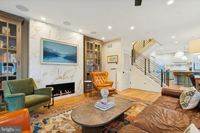a view of a livingroom with furniture and window