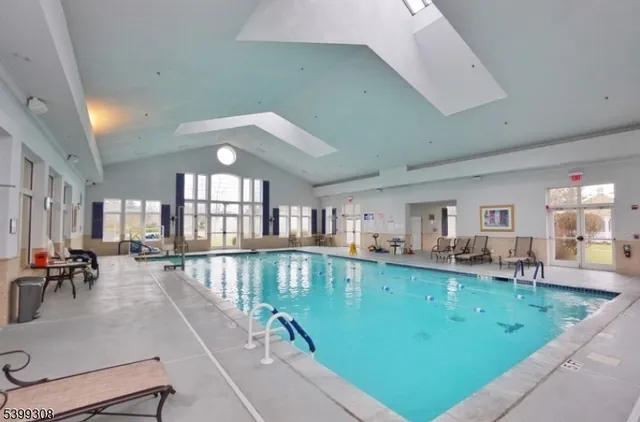 a view of a living room and dining room