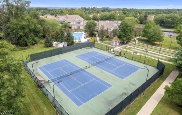 a view of a pool with a lake view