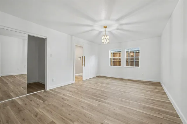 a bathroom with a sink mirror toilet and bathtub