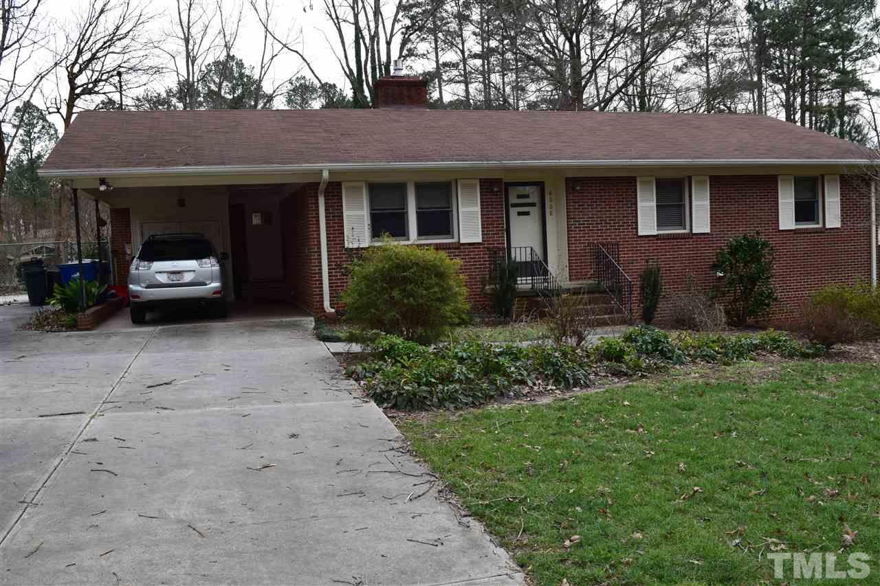 6908 Justice Drive Raleigh, NC 27615 - Photo 1 of 15 Brick ranch with carport.