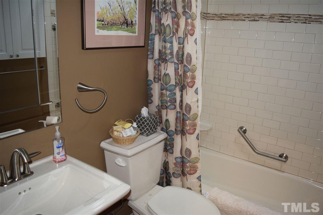 6908 Justice Drive Raleigh, NC 27615 - Photo 14 of 15 Full hall bath upgrade last year.