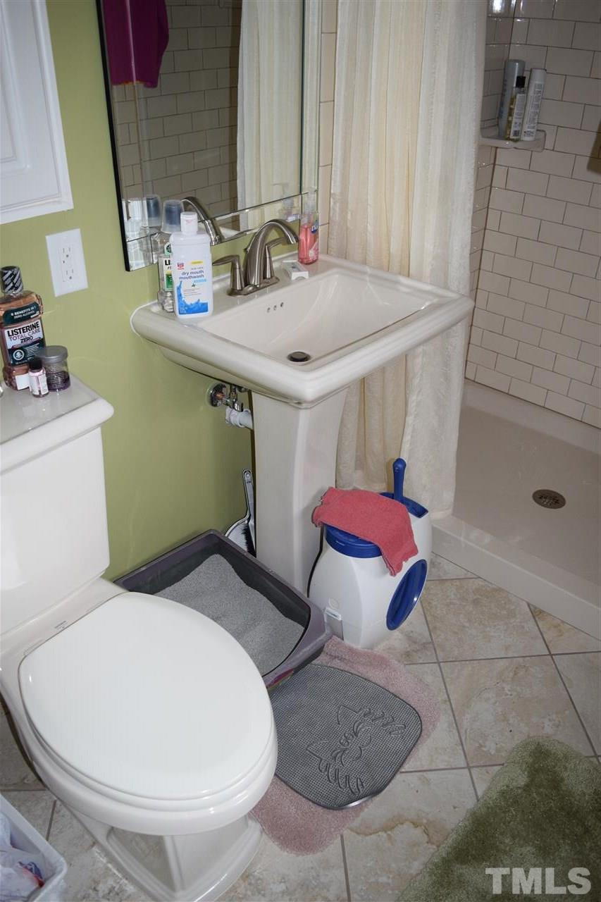 6908 Justice Drive Raleigh, NC 27615 - Photo 15 of 15 Master bath upgraded last year.