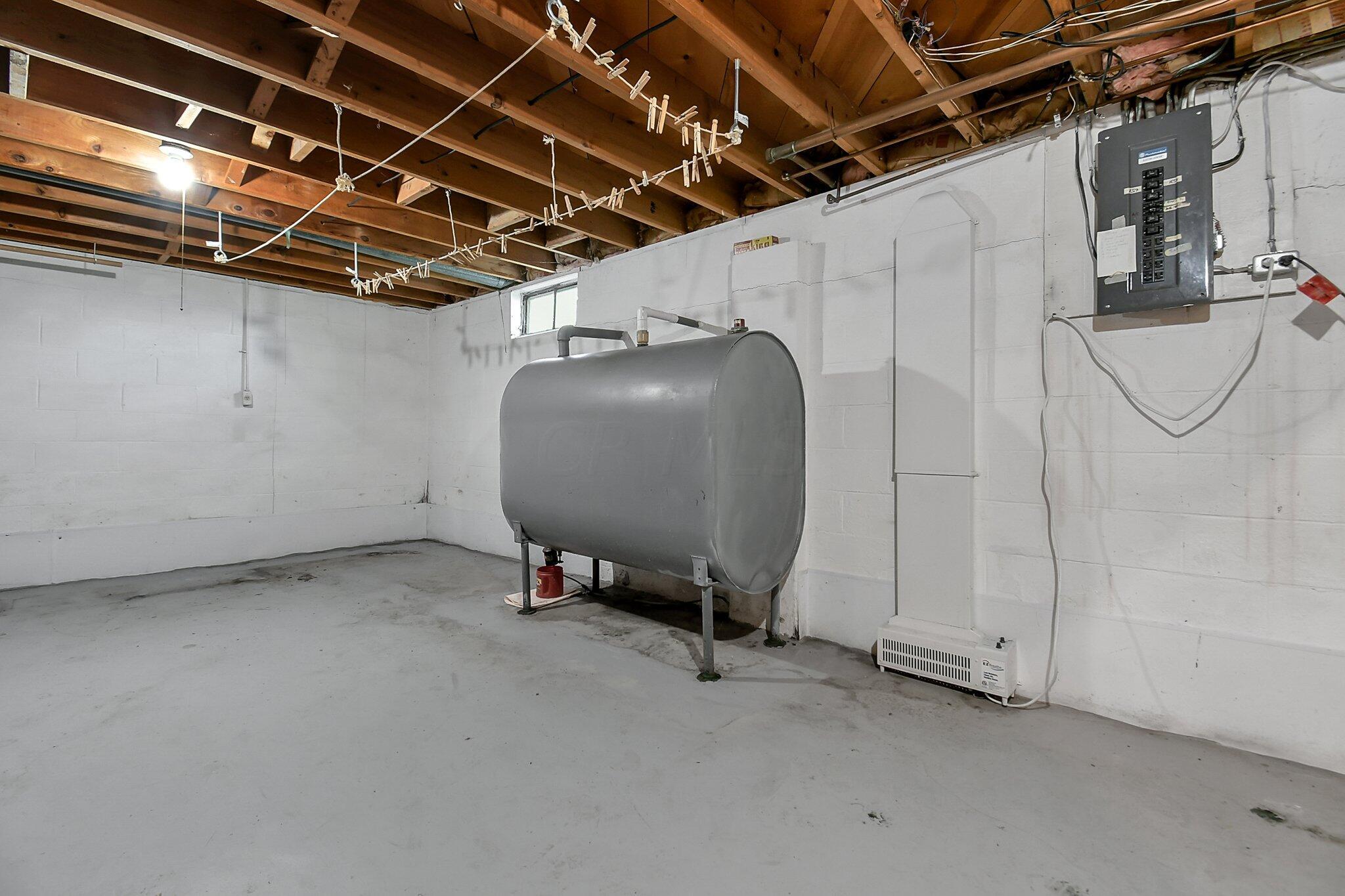 429 Amity Road Galloway, OH 43119 - Photo 21 of 27 shown is the oil tank, area is clean, ready for storage. Move in condition. Floor painted/walls painted