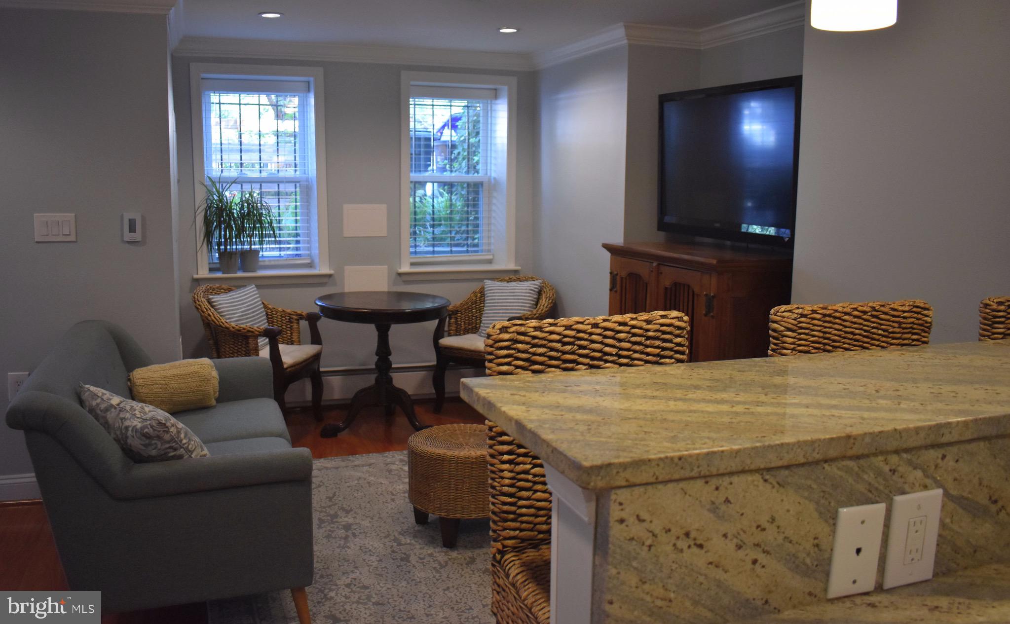 a view of a livingroom with furniture and window