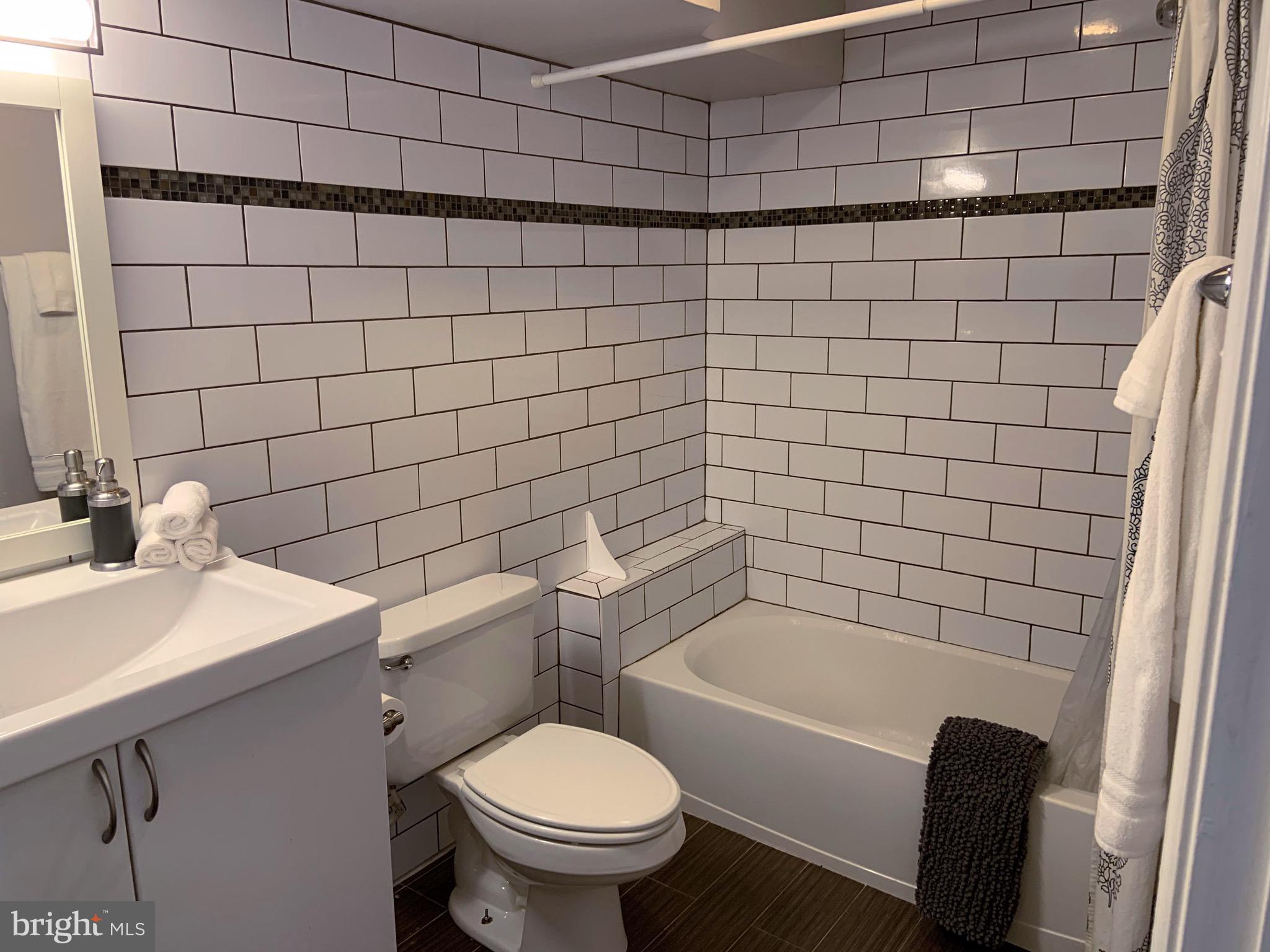 22 N Street Northwest, Unit B Washington, DC 20001 - Photo 13 of 15 a bathroom with a sink toilet and shower