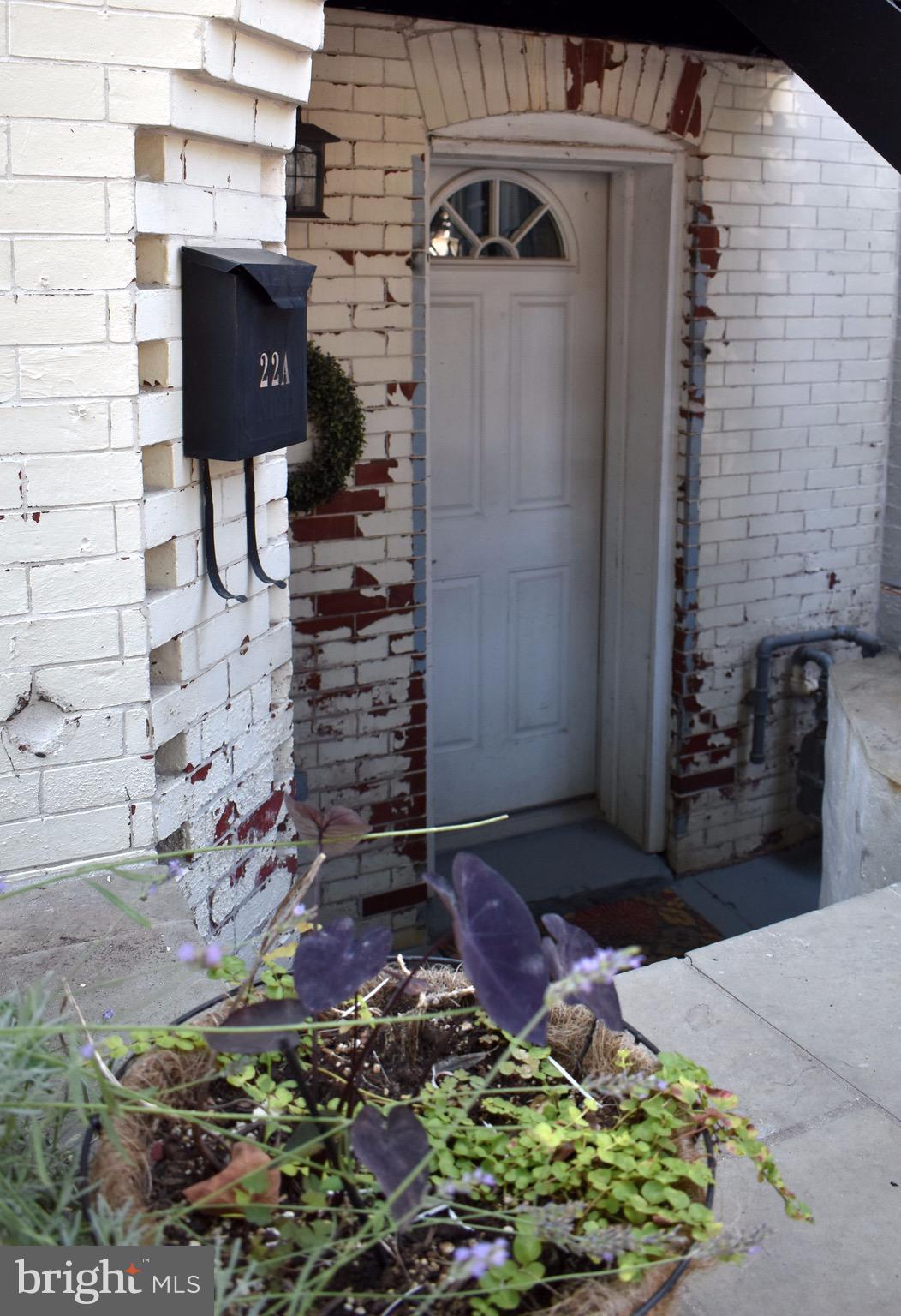 22 N Street Northwest, Unit B Washington, DC 20001 - Photo 15 of 15 a front view of a house with a yard
