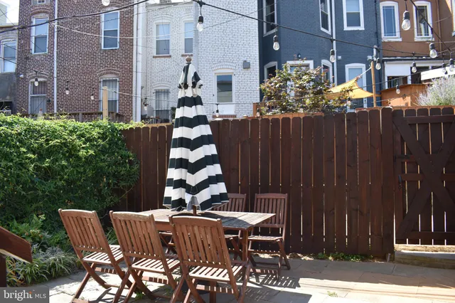 a view of a chairs and tables in the patio