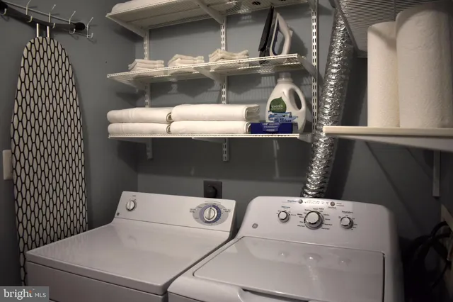 a view of washer and dryer with washer and dryer