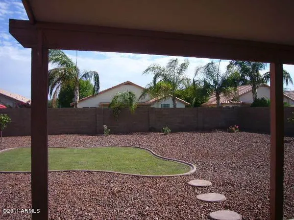 a view of a backyard of a house