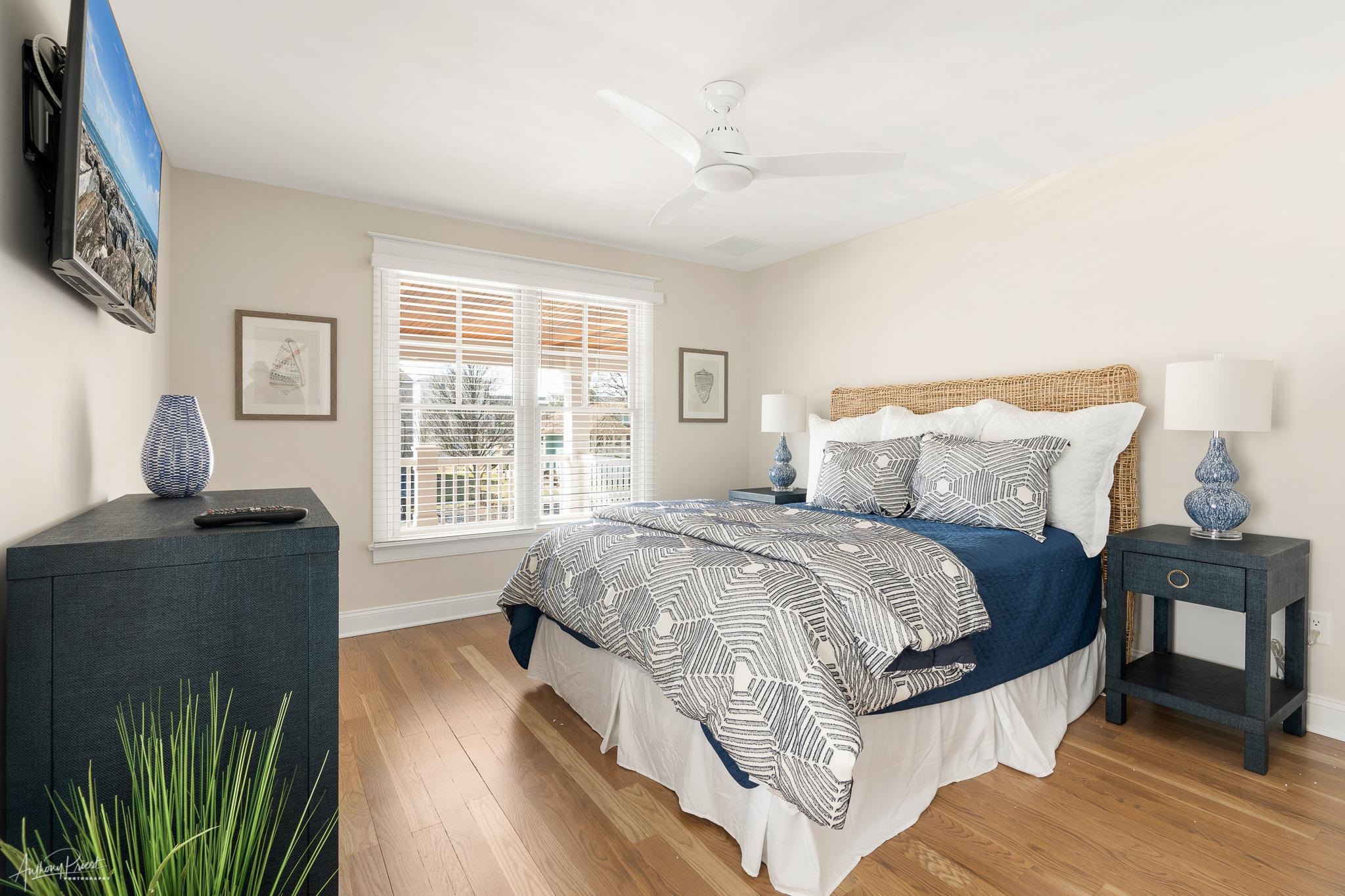 169 27th Street Avalon, NJ 08202 - Photo 14 of 32 a bedroom with a bed and wooden floor