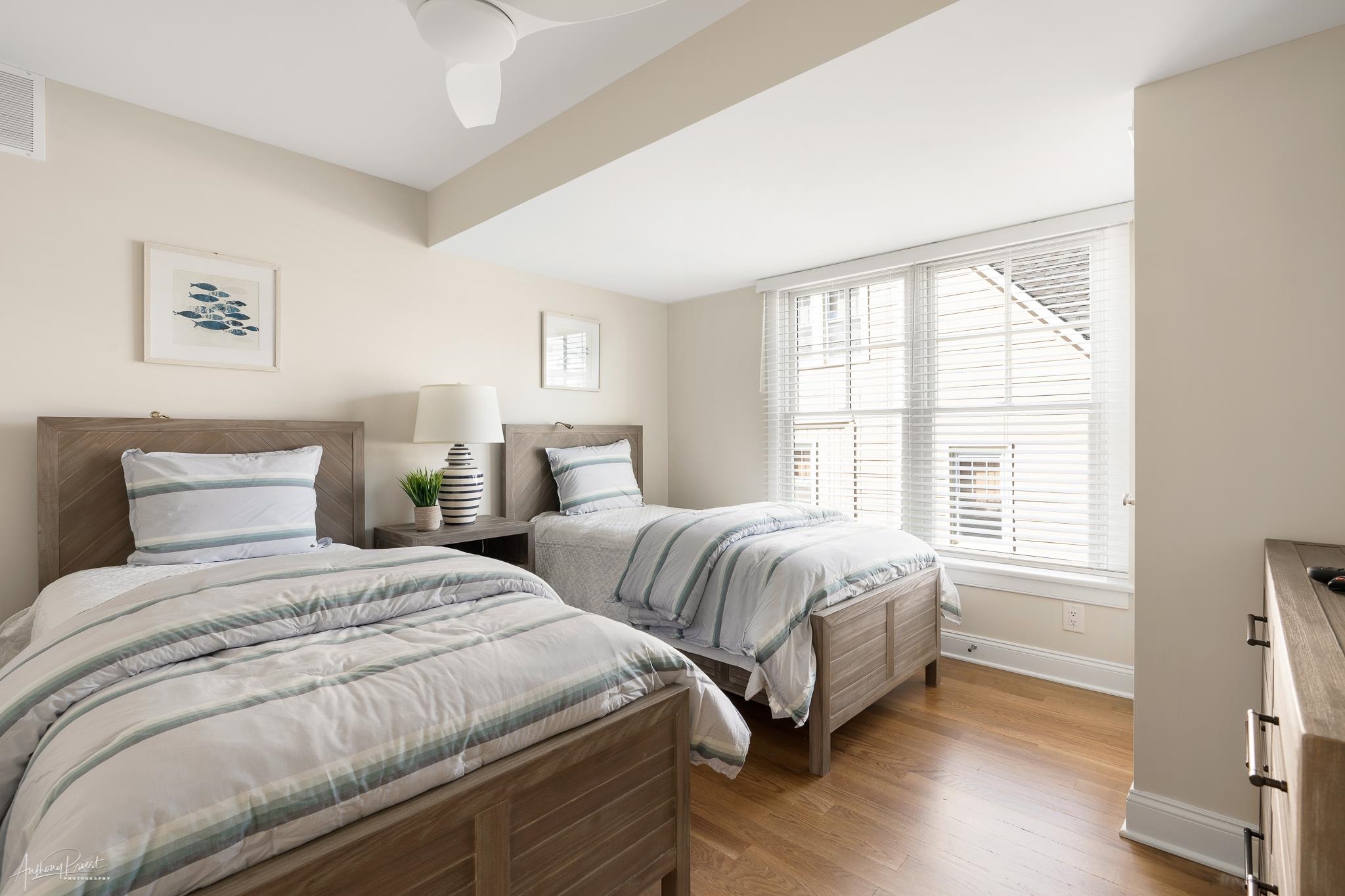 169 27th Street Avalon, NJ 08202 - Photo 15 of 32 a bedroom with two beds and a large window
