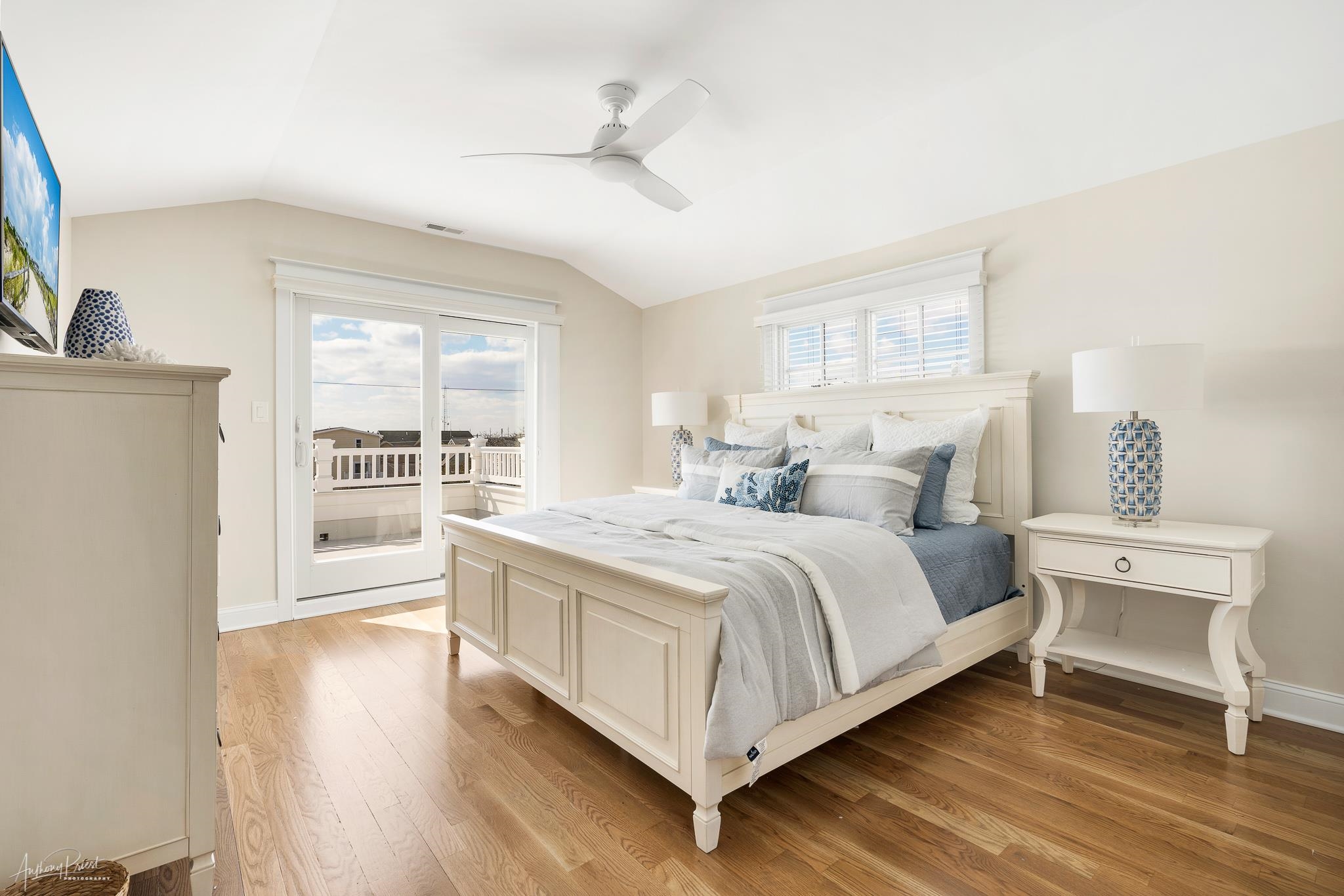 169 27th Street Avalon, NJ 08202 - Photo 23 of 32 a bedroom with a bed and a large window