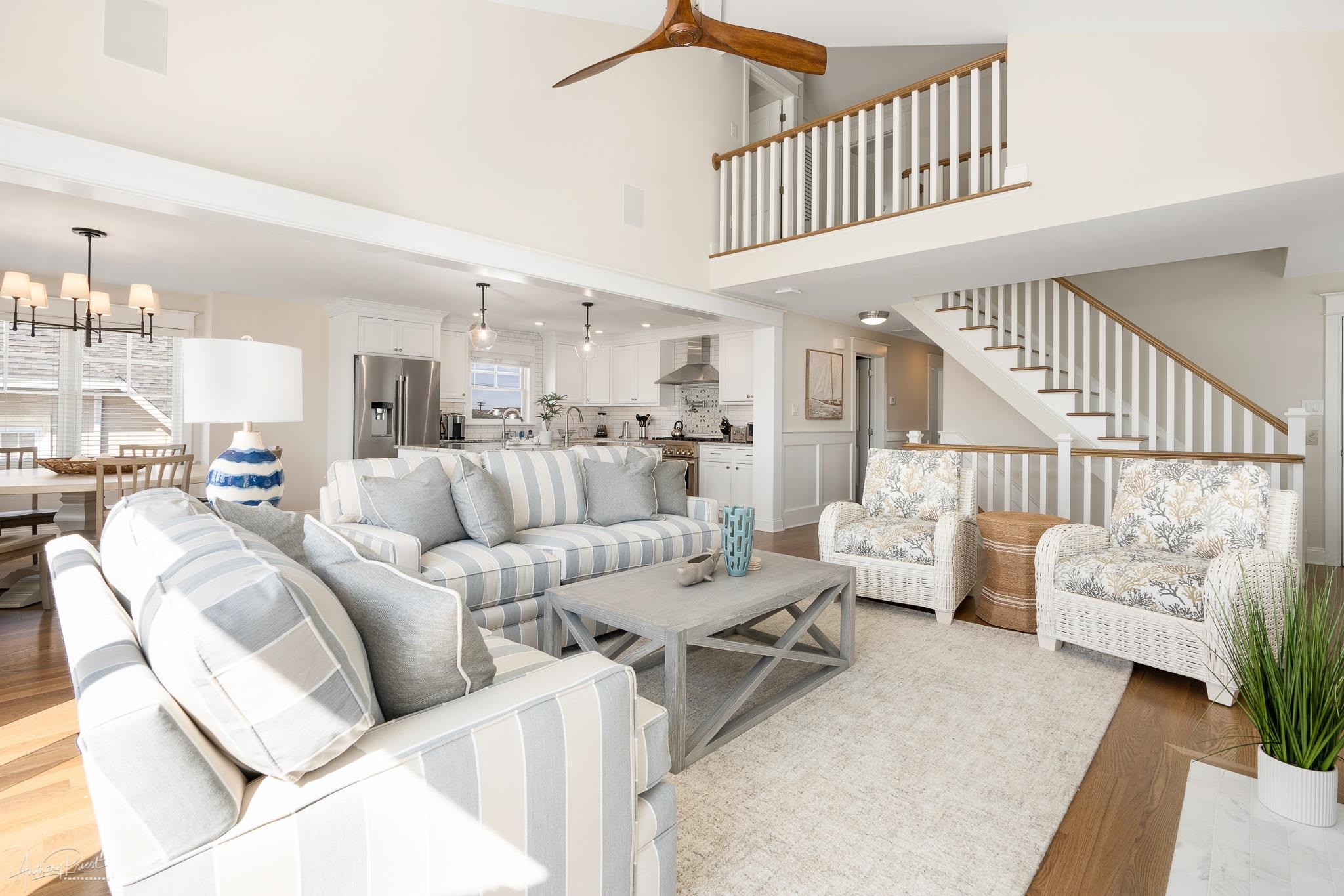 169 27th Street Avalon, NJ 08202 - Photo 10 of 32 a living room with furniture or stairs and a couch