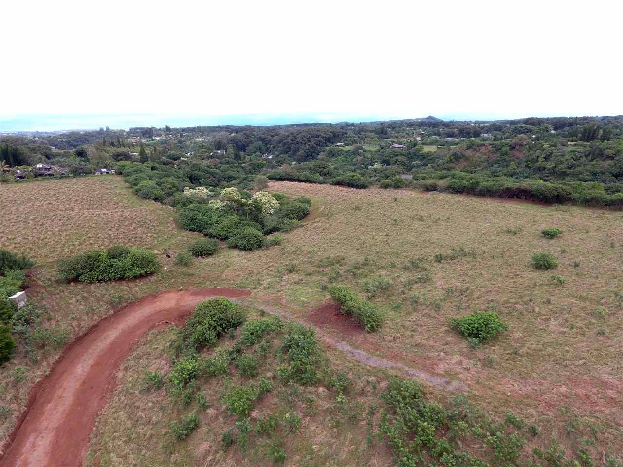 1855 Kauhikoa Road, Unit 222B Haiku, HI 96708 - Photo 9 of 15 an aerial view of mountain with beach