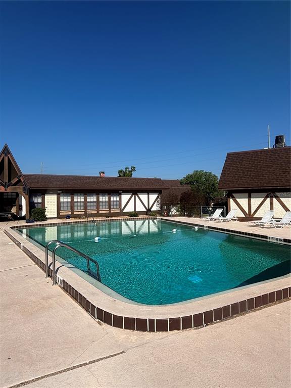 500 Newell Hill Road, Unit 101A Leesburg, FL 34748 - Photo 20 of 20 a view of a swimming pool with a garden